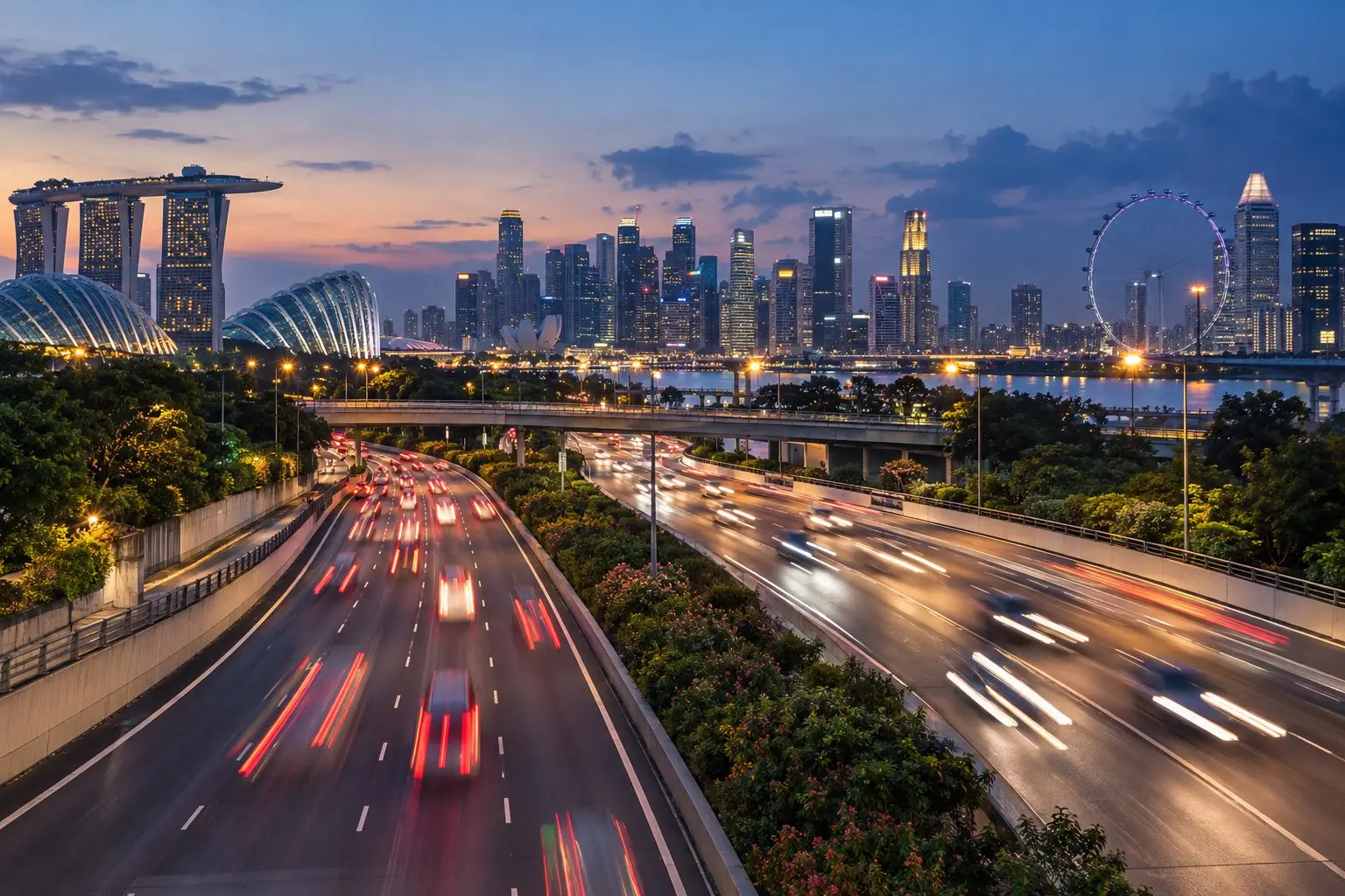 Singapore expressway traffic at dusk with the city skyline in the distance